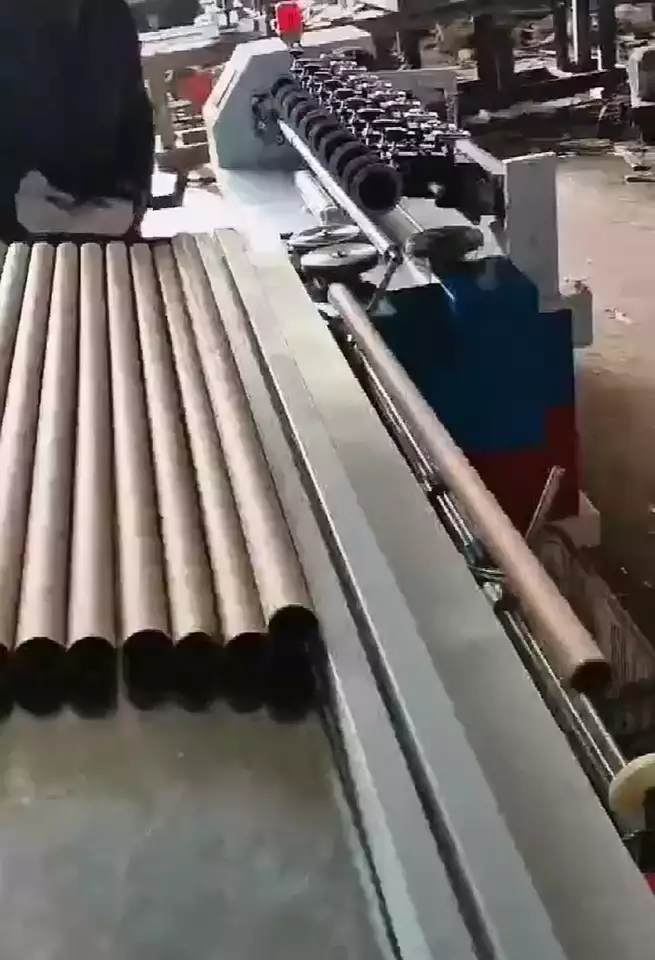 Máy cắt lõi ống giấy cấp phối tự động